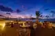 Maldives dining at a charming beachside restaurant with sunset views and tranquil ambiance.